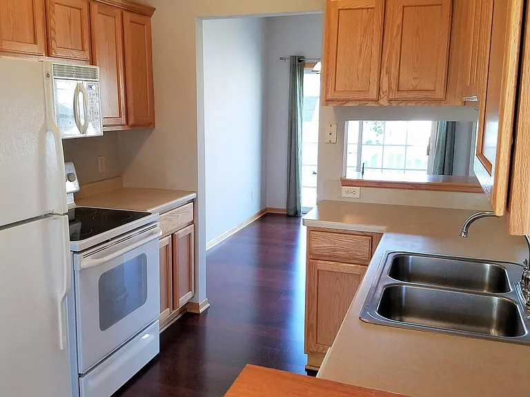 Galley kitchen includes all kitchen appliances