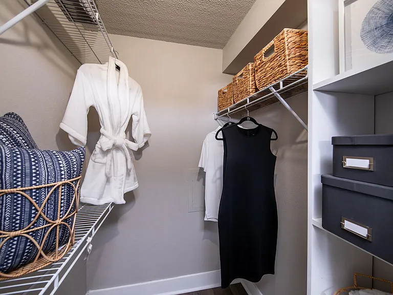 Discover the convenience of our spacious walk-in closets complete with ample shelving and hanging space to keep your wardrobe organized and easily accessible.