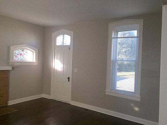 living room with super tall windows