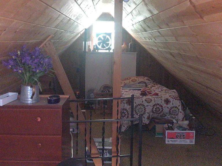 Fan in window helps keep upstairs cool in summer. No a/c.