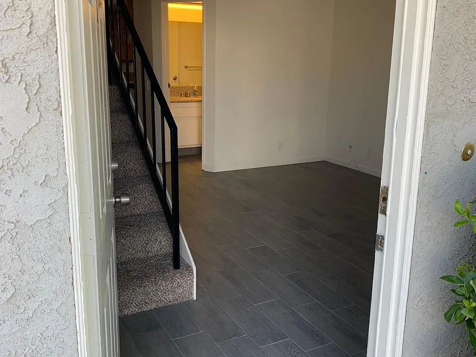 Front Door and Living Room