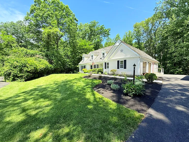 Beautifully renovated home tucked away on a quiet cul-de-sac in a great neighborhood with a wooded lot in the heart of Great Falls