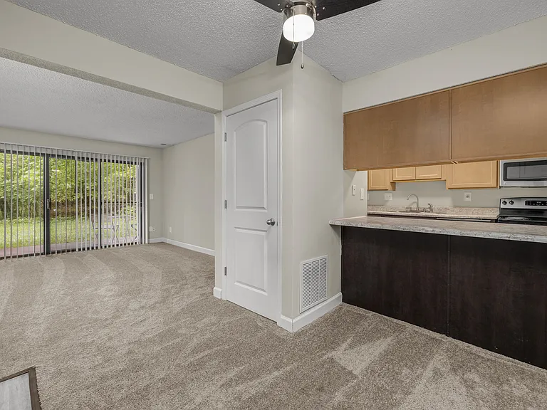 Pebble Point Apartments | 2 Bedroom Garden Remodel | Living & Dining Space Pebble Point Apartments | 2 Bedroom Garden Remodel | Living & Dining Space