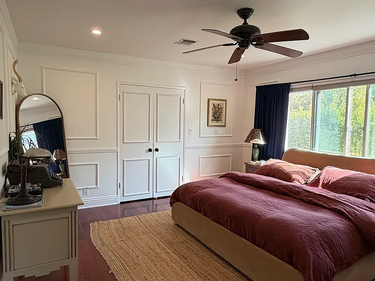 Primary bedroom with lots of closets