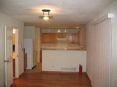 Hard wood floor in kitchen, living room and family room
