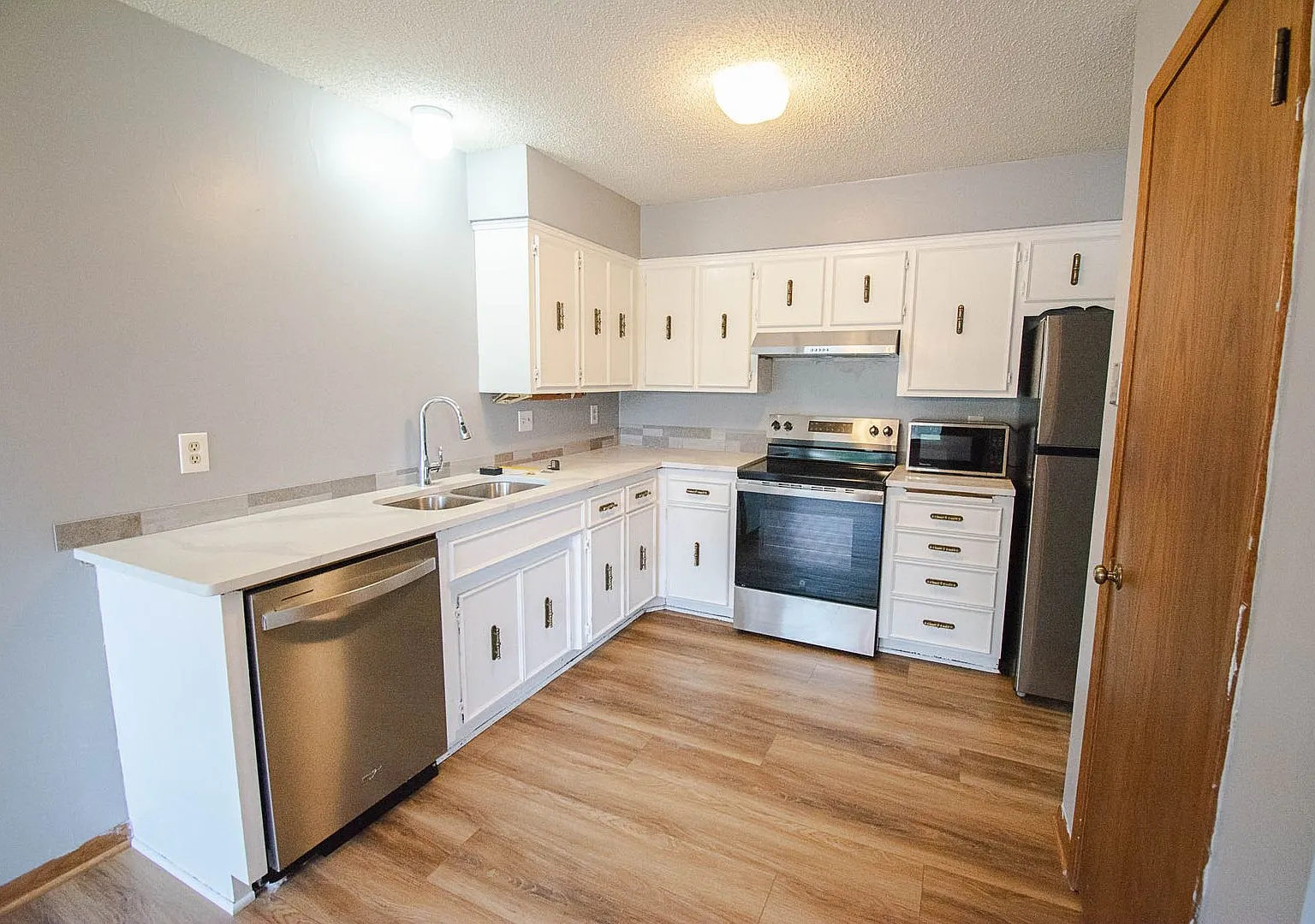 2BR Twin Home with Garage & Great Outdoor Space! — Photo 4