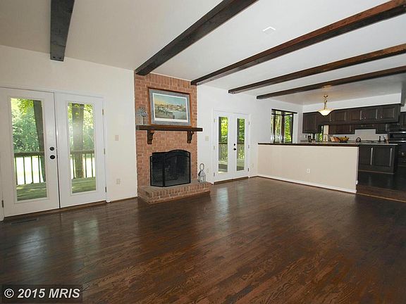 Rich Hardwoods / Open Floor Plan / 3 Fireplaces