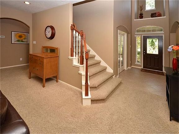 Flowing floorplan enhances the spaciousness of this home.