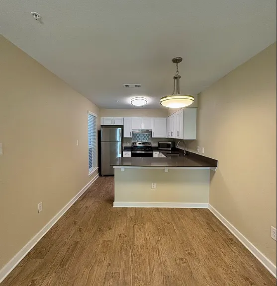 Brand New Construction Building with quartz countertops and top of the line finishes.
