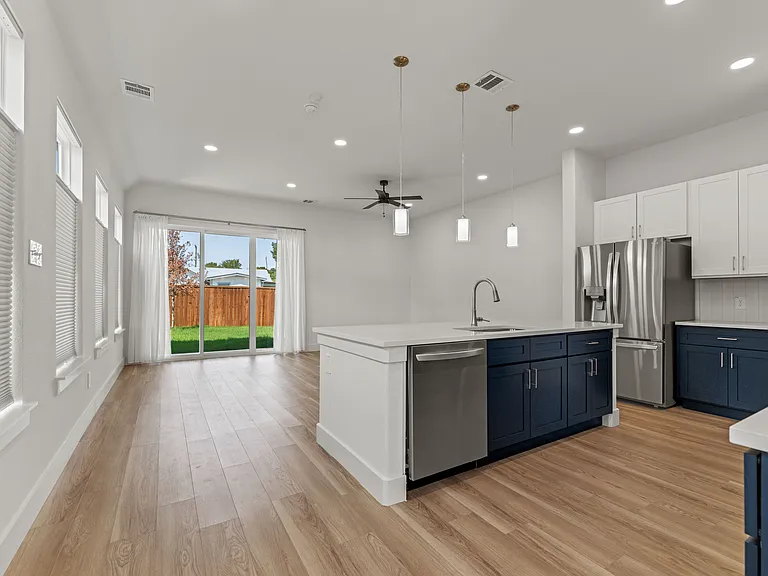 Open concept design and high ceilings throughout the home makes this 2000+ sq ft home feel even larger!