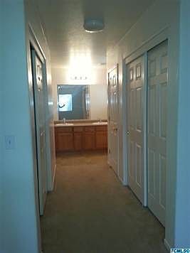 His and Her Closets in Master Bedroom