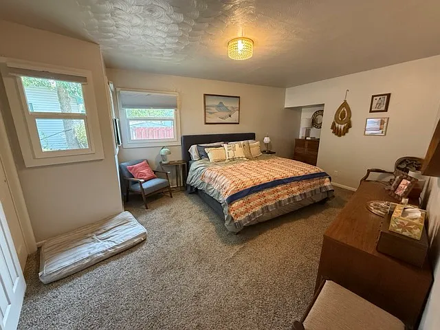 Large primary bedroom. Easily fits king sized bed + furniture.
