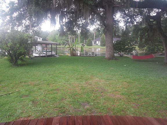 Large backyard with Oaks