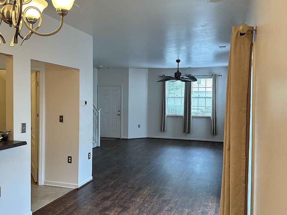 DINING ROOM LOOKING INTO LIVING ROOM
