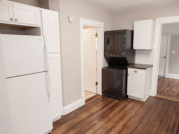 Kitchen with washer dryer
