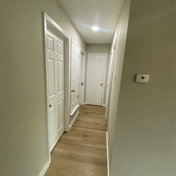 Hallway to bedrooms and bathroom
