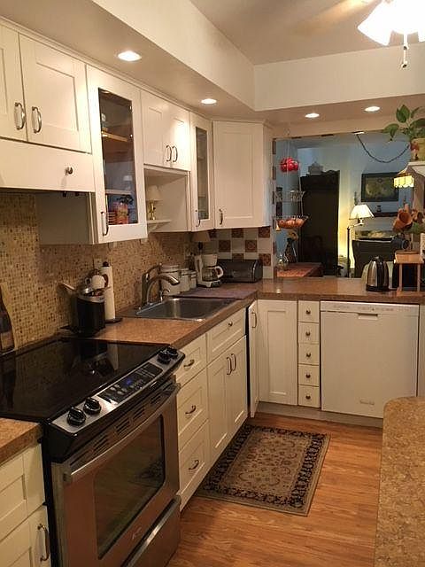 New kitchen with spices included plus all that is on counter. New stainless Steel dish washer with third rack just installed. Brand new microwave is within a niche in the right wall.
