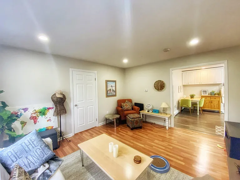 Living room w view to eat in kitchen area.