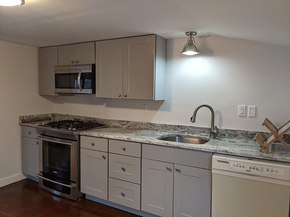 Kitchen with granite counters, 2 windows, stainless sink & dimmable lights
