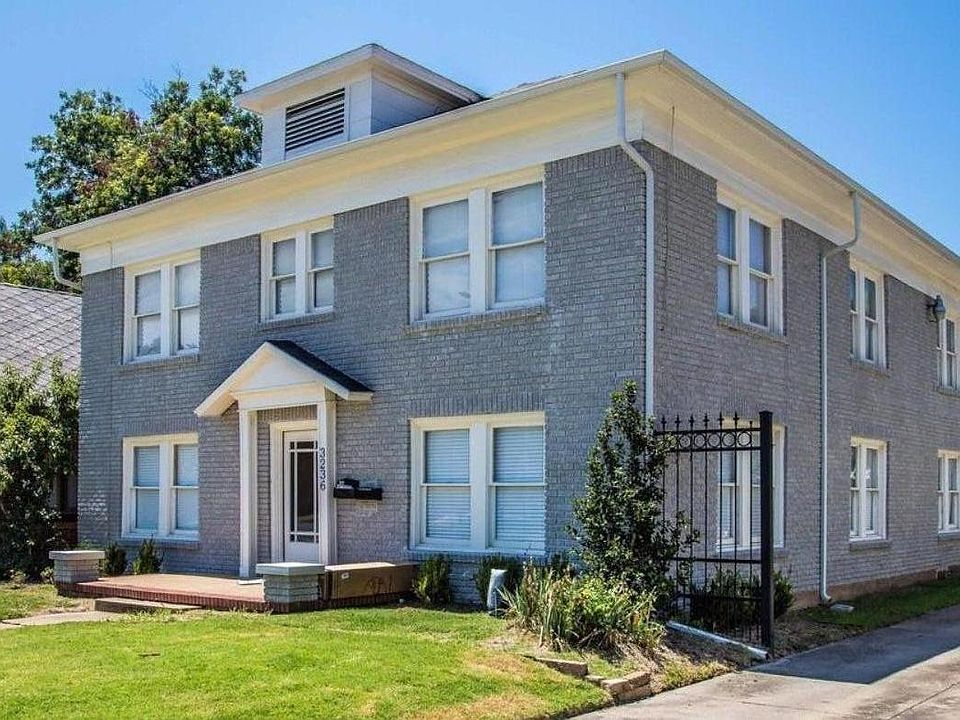 Single driveway with fenced in back yard and parking with plenty of lighting.