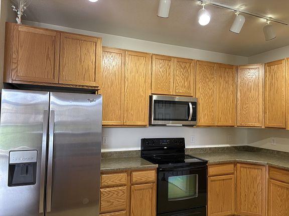 Kitchen room with all necessary appliance and cabinet space.
