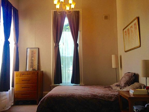 Intimate Bedroom with organic Saatva mattress, walk-in closet