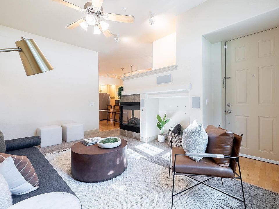 Living Room with Gas Fireplace TV nook and Front Door