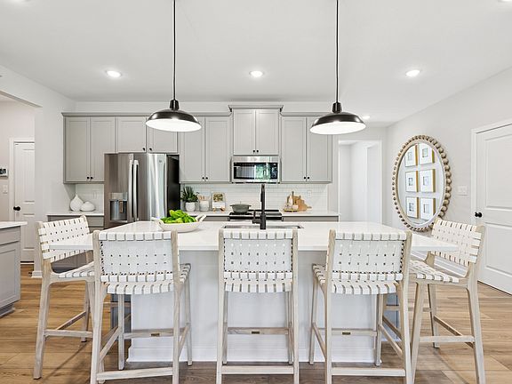 Kitchen with center island and pendant lighting