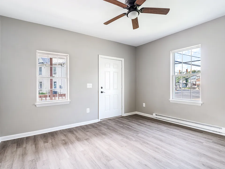 Living Room with door to the front of the house