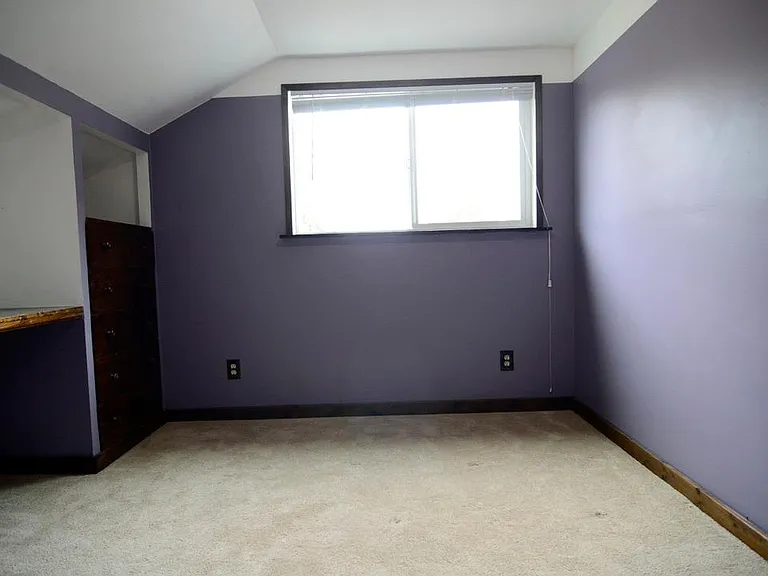 First bedroom with newer window.