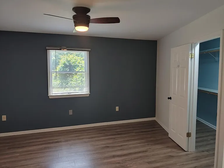 First bedroom with walk-in closet.