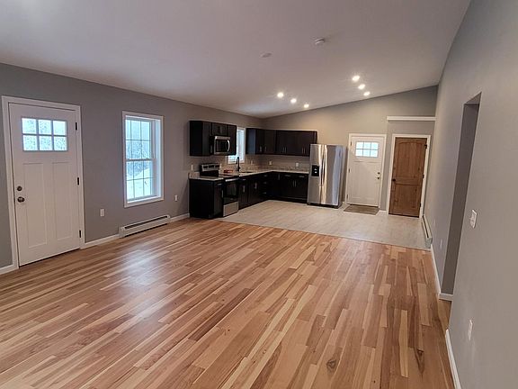 Open concept Livingroom / Dining room / Kitchen 16 x 36 with vaulted ceiling