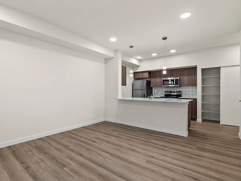 Spacious open floor plan with modern kitchen. Spacious open floor plan with modern kitchen.