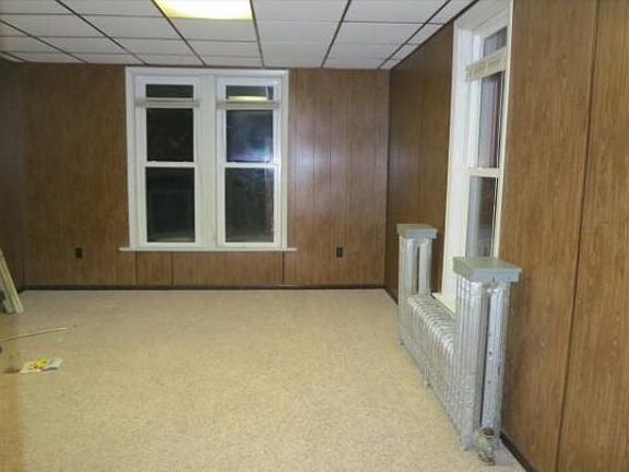 Living room facing fourth Street and Lake superior