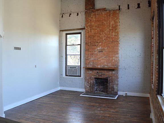 Exposed brick, fireplace is non functional