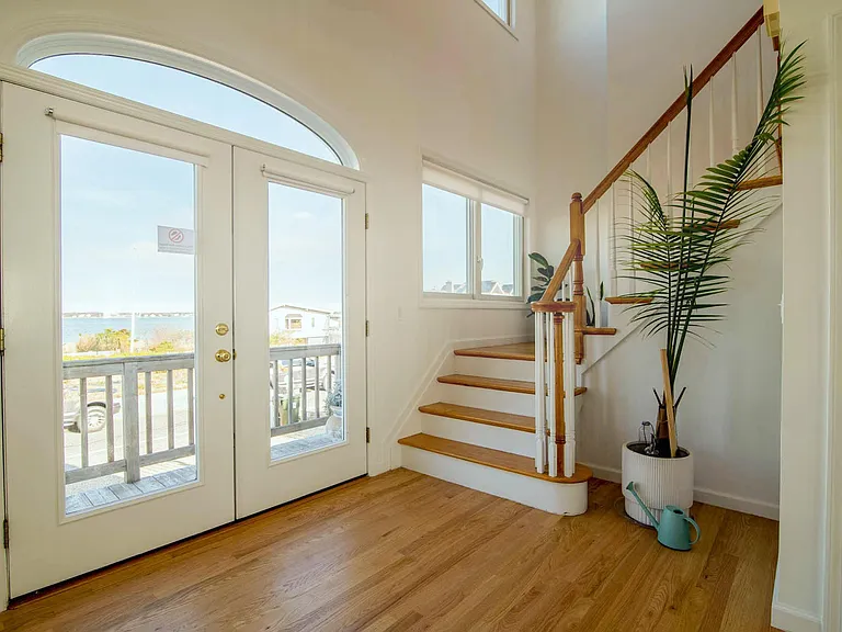 Stairs to second story 4 bedrooms, 3 full bathroom and laundry center.