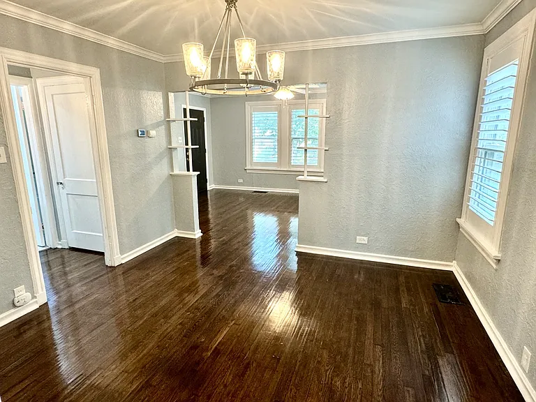 View from the kitchen, looking into the dining room, and the living room.