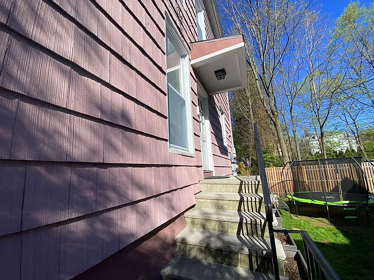 Private entrance to stairway leading to 3rd floor apartment