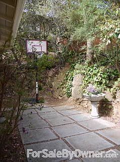Stained Wood Breakfast Bar
						:
						Enjoy a cup of English Breakfast tea or a glass of Cabernet here!