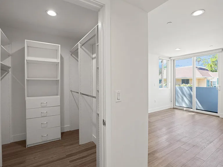 Master Walk-In Closet with Built-In Organizers