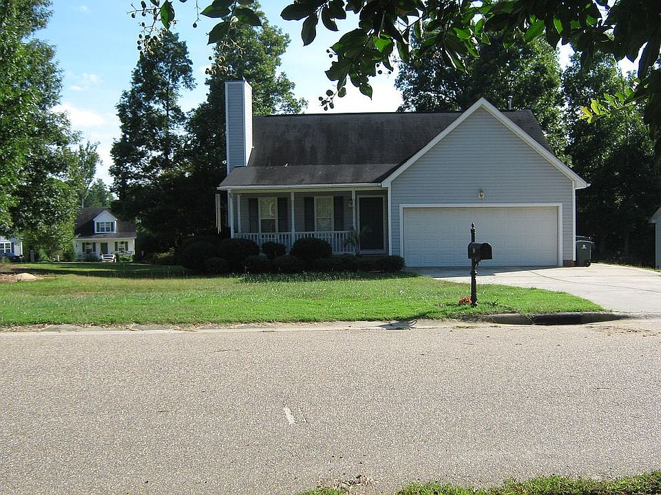 Outside front, garage closed