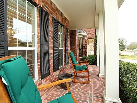 Sit back and relax on the covered front patio.