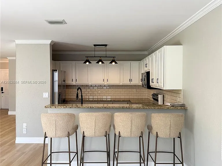 9411 NW 55th St — Photo 11