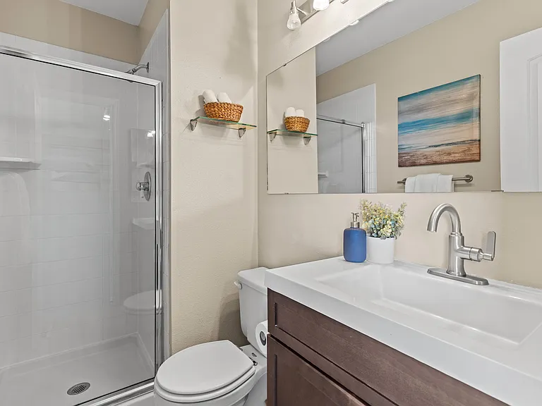 Attached bathroom in primary bedroom.