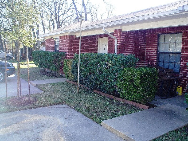 front of the duplex with parking in the front of each unit