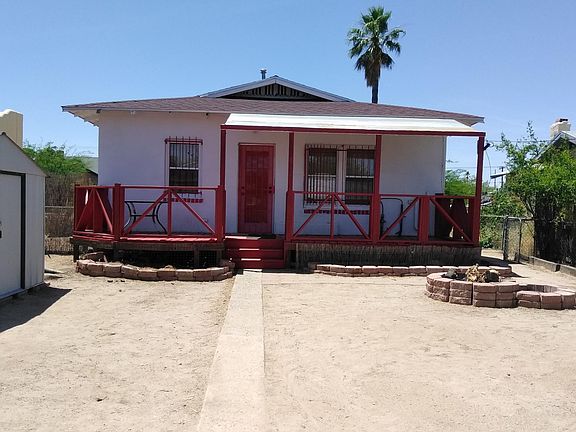 Back of home with deck...