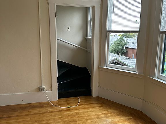 Living room with freshly refinished floor.