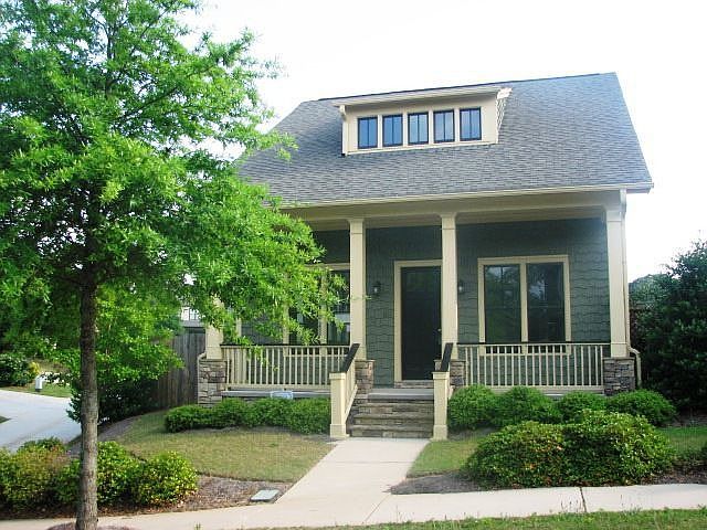 Beautiful newer neo-craftsman style home in Tributary with open floor plan, big yard and detached ga