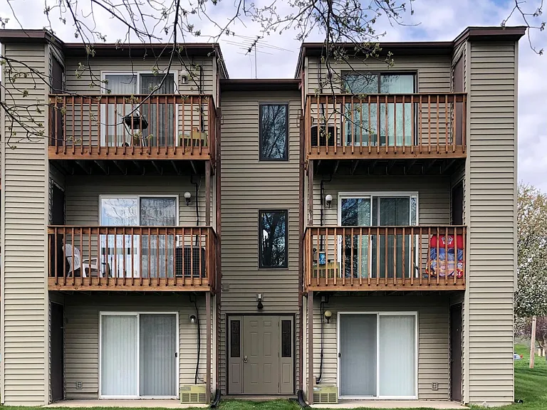 Another view of the building with Unit 2 being the top left deck.