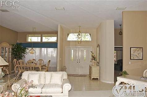 View of the entry, and formal dining room.